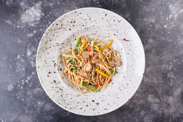 Healthy whole grain spaghett iwith chickens and vegetables, pasta. Top view.