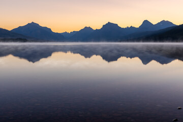 sunrise foggy mountain lake