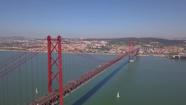 drone image of bridge 25 de abril in Lisbon Portugal, Almada view of the Capital.  clear view 
