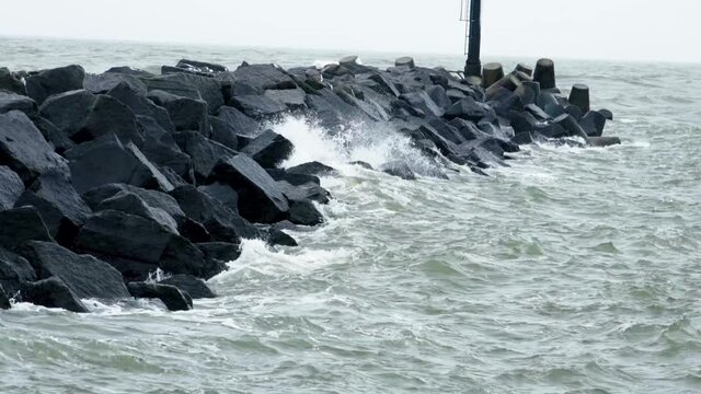 Waves roll on the rocks.