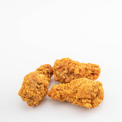 Fried Chicken Breast in Oil and Fried chicken legs, White Background