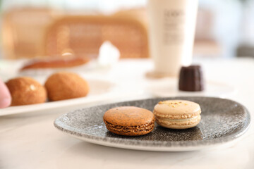 brown macaron dessert in coffee shop background