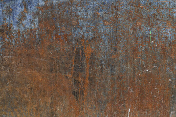 Old zinc texture background. Rusty metal plates with many colors and parts where the color has fallen and is seen rust.