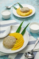 Mango Sticky Rice with coconut milk as sweet dessert from Thailand 