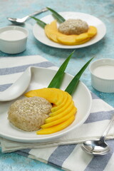 Mango Sticky Rice with coconut milk as sweet dessert from Thailand 