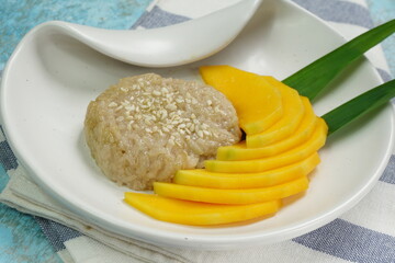 Mango Sticky Rice with coconut milk as sweet dessert from Thailand 