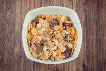 Portion of muesli in glass bowl. Healthy nutrition as source dietary fiber. Increase metabolism