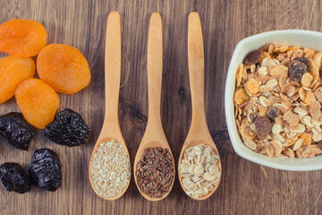 Linseed, oat bran, dried fruits and muesli. Healthy food containing minerals and fiber. Increase metabolism