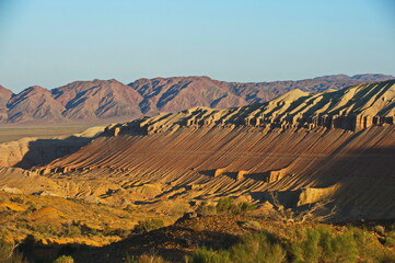 Almaty, Kazakhstan - 06.25.2013 : Sand and stony hills with rocks of different colors in the Altyn Emel Nature Reserve