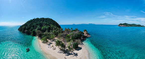Fototapeta premium aerial bird eye panorama view of Rayang island, mountain island in clear blue sea and sky 