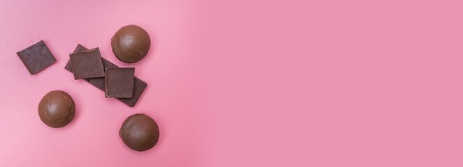 Valentine dark chocolate on pink background, Valentines Day Theme, Banner background