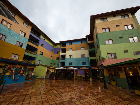 Picturesque colorful facades buildings square Plazoleta de Zocalos town village Guatape Pueblo in Antioquia Colombia