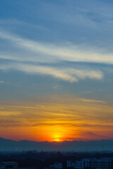 Bright sunrise or sunset in the morning, Cloudy sky and bright sunrise over the horizon.