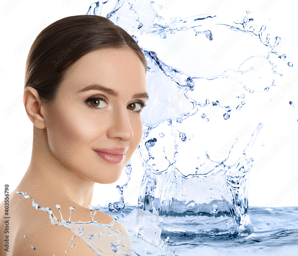 Canvas Prints Beautiful young woman and splashing water on white background. Spa portrait