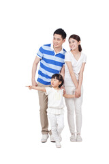 Portrait of a young family of three 