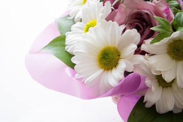 Bouquet of daisies on a white background close-up. Valentine's Day Gift.