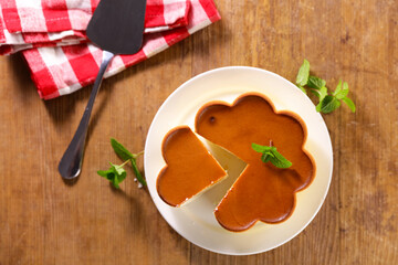 cheesecake on wood background- top view