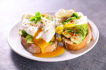 bread toast with poached egg and avocado