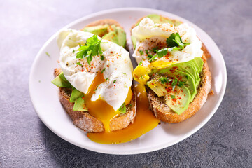 bread toast with poached egg and avocado