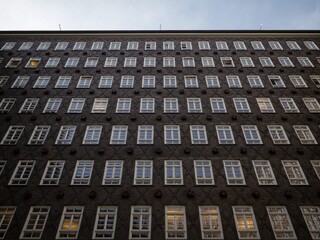 Inner courtyard facade of historical building Sprinkenhof Brick expressionist architecture...