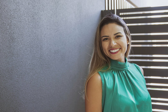 Portrait of Beautiful happy and healthy middle aged Brazilian woman smiling with confidence, business woman with smart casual look, women's day
