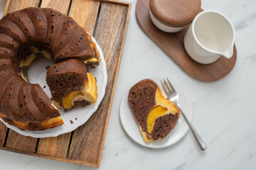 home made poppy seed sponge cake on a table