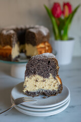 home made poppy seed sponge cake on a table