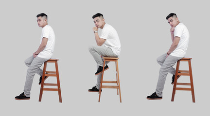 Indonesian man in white T-shirt isolated on background