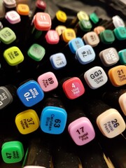 A set of colored felt-tip pens have artistic