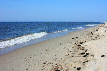 Sandy shore of the blue Baltic Sea