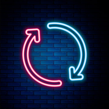 Glowing neon line Refresh icon isolated on brick wall background. Reload symbol. Rotation arrows in a circle sign. Colorful outline concept. Vector.