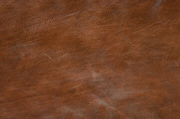 texture of genuine leather is brown with scuff