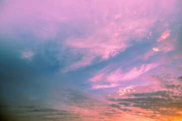 Colorful cloudy sky at sunset. Gradient color. Sky texture. Abstract nature background