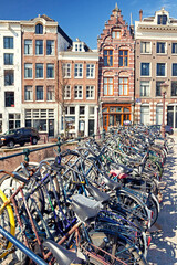 Fototapeta na wymiar Parked bicycles in centre of Amsterdam, netherlands