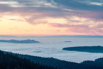 Fototapeta na wymiar Gurten and Berner Mittelland over sea of fog at sunset