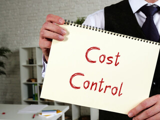 Cost Control phrase on the piece of paper.