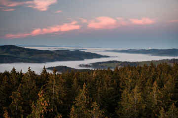 Naklejka na ściany i meble hills of Emmental at an autumn sunset with sea of fog