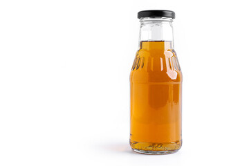Apple juice in bottle on a white background.