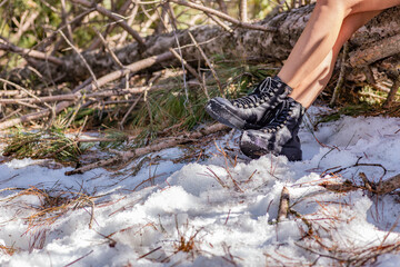 The woman boots on snow in Turkey mountains.