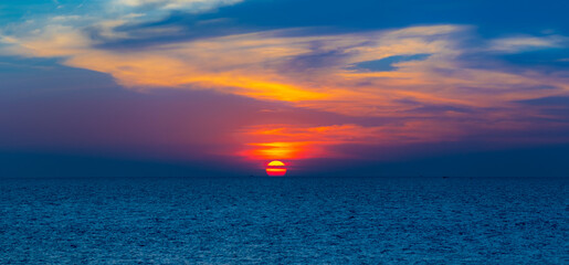 Sunset to twilight at the Andaman Sea of Thailand. Sunrise in the morning.