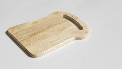 Mini wooden chopping board isolated white background