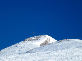 Summit cross of Pleisenspitze mountain, Tyrol, Austria