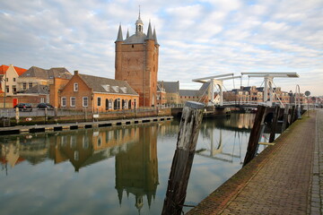 Reflections of Zuidhavenpoort, the Southern harbor gate, with a drawbridge, Zierikzee, Zeeland, Netherlands