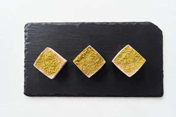 Healthy desserts on a black tray. Proper gluten-free nutrition. Homemade.