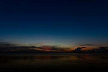 Twilight sky with star and motion water surface at the lake.