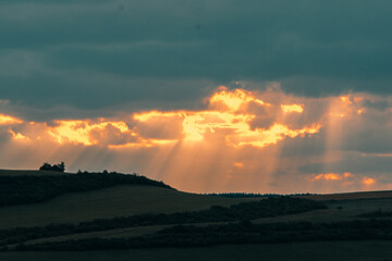 Sunrays going through clouds 