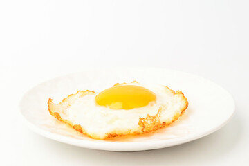 Fried eggs on white background
