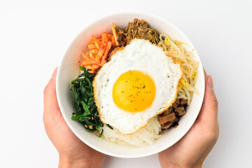 Seasoned rice with vegetables on white background