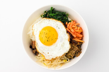 Seasoned rice with vegetables on white background