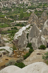 Detail from landscape with magnificent stone structures and caves near Goreme at Cappadocia, Anatolia, Turkey
